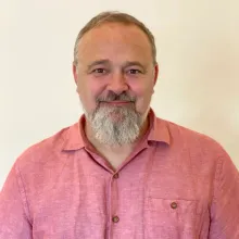 Portrait of Rob Arnold against a plain background